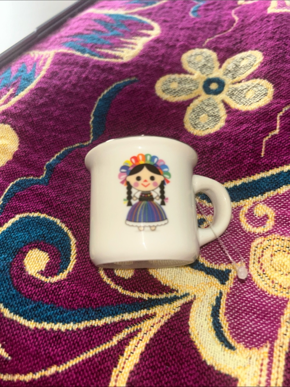 White Ceramic Mug with Colorful Folk Doll Design from Mexico